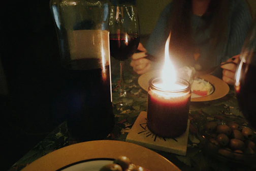 a candlelit dinner display with warm ambience 