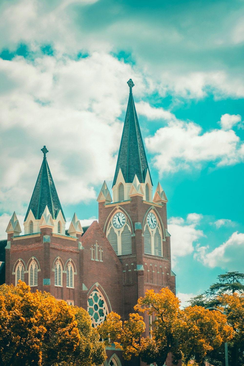 a church with a clock on the front of it