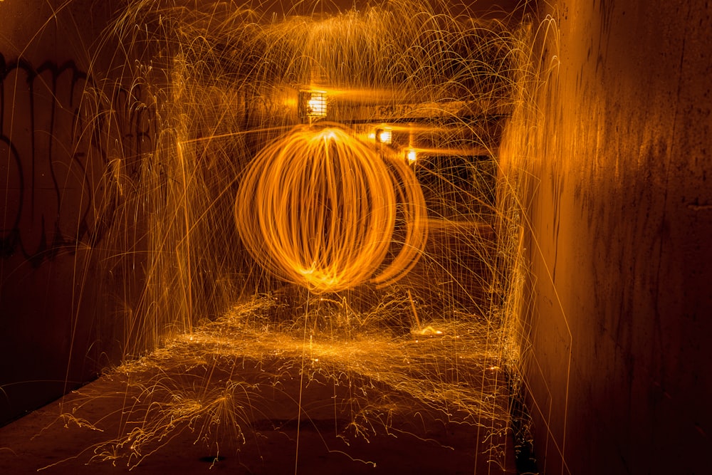 a large metal object is spinning in a tunnel