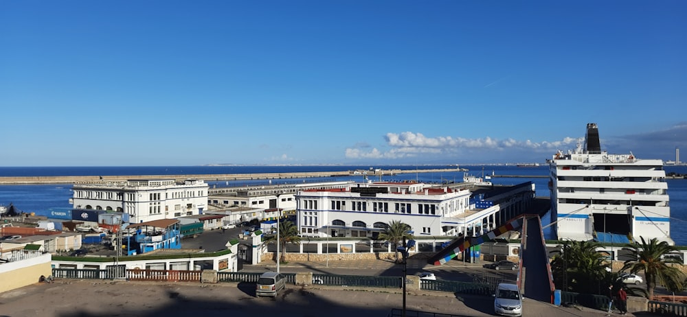 a view of a city with a body of water in the background