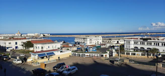 a view of the ocean from the top of a building