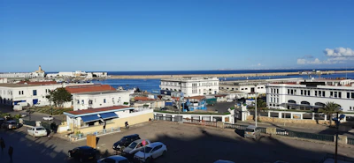 a view of the ocean from the top of a building