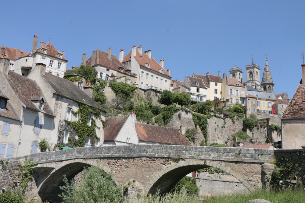 a bridge over a river in a small town