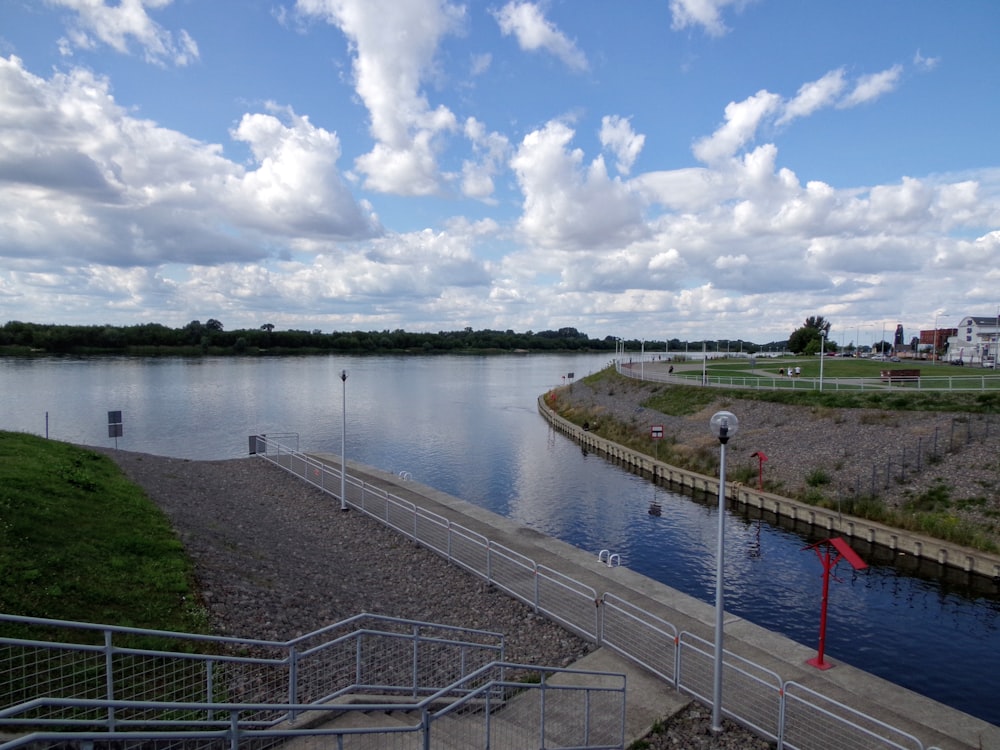 a view of a body of water from a bridge