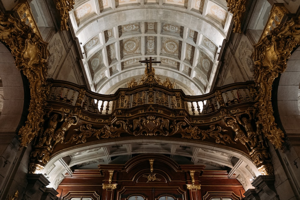 a church with a cross hanging from the ceiling