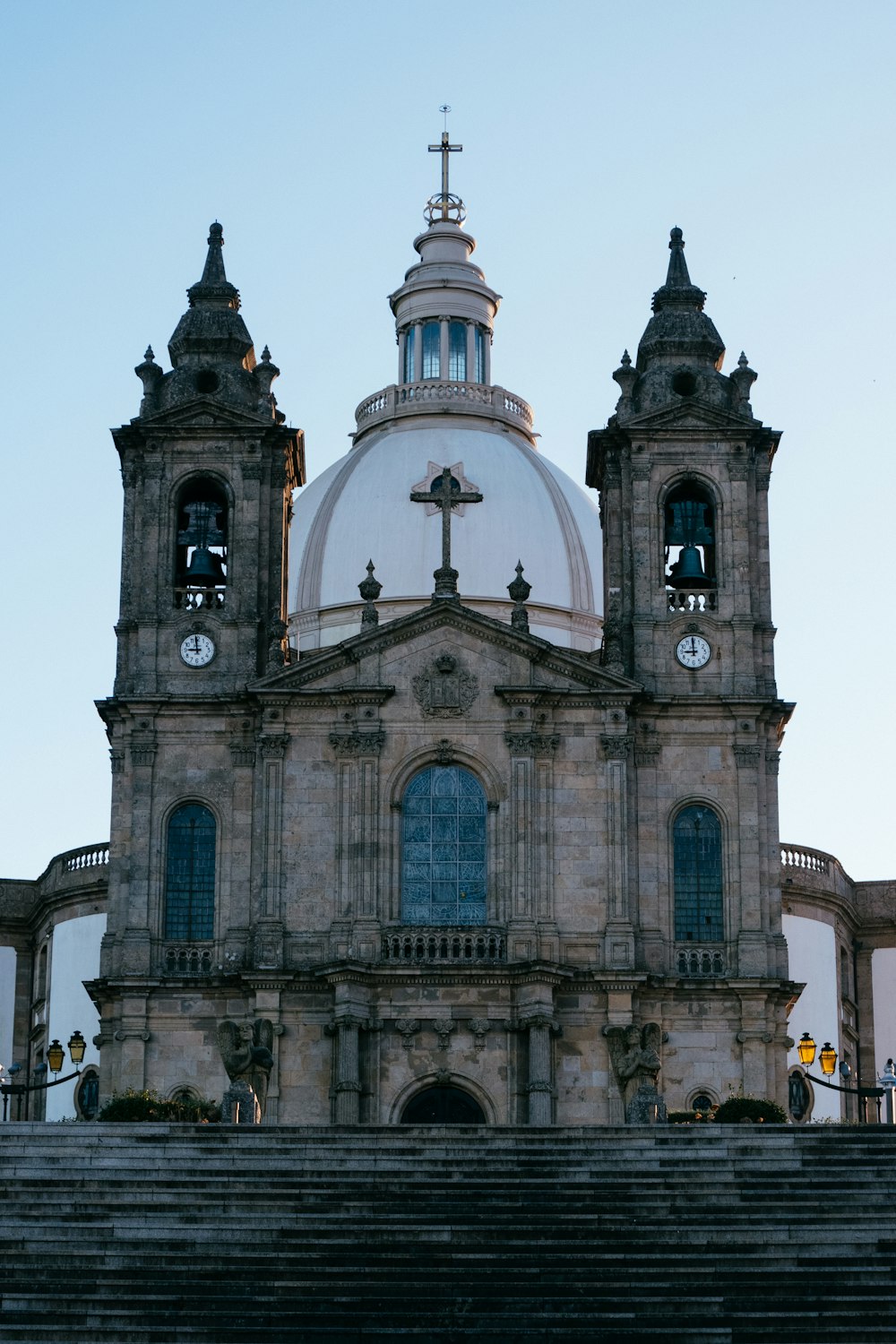 a church with a steeple and a clock tower