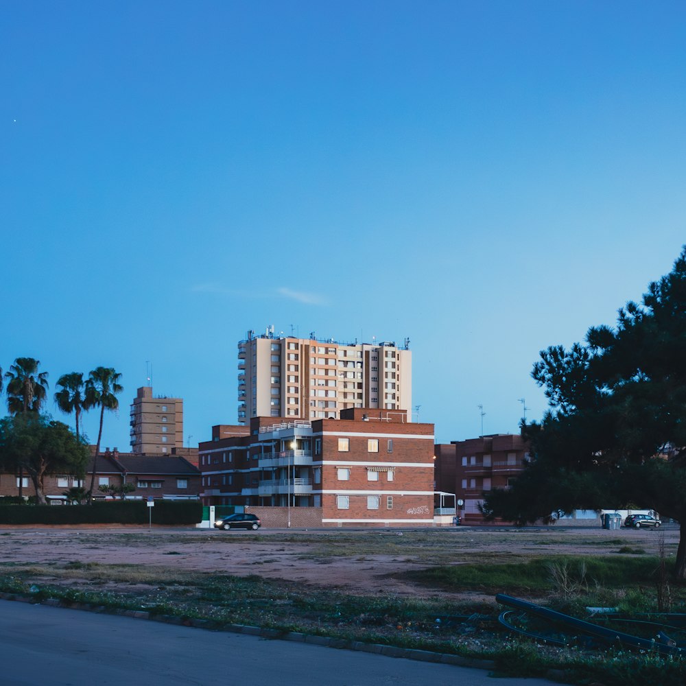 a large building sitting in the middle of a field