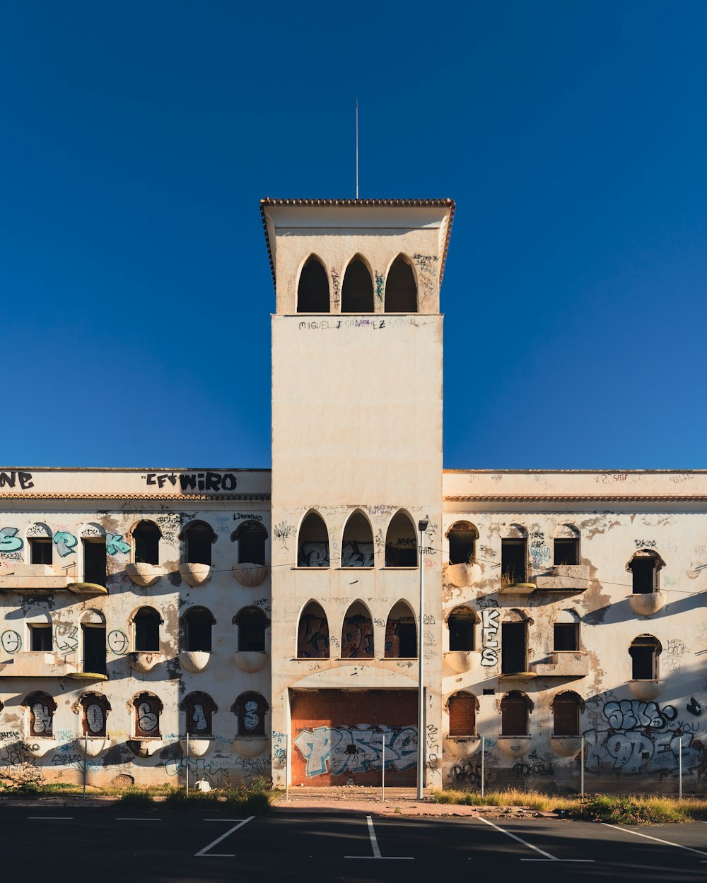 a tall building with a clock tower on top of it