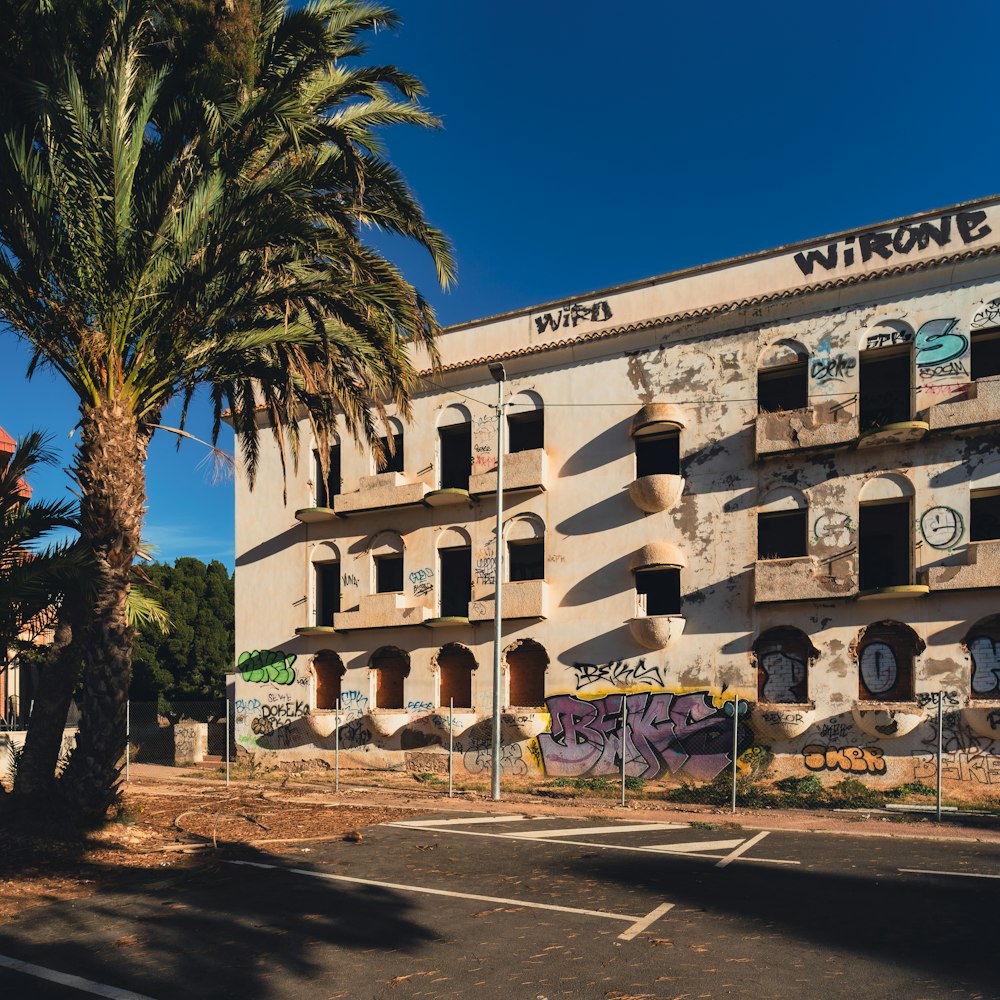 a large building with graffiti on the side of it