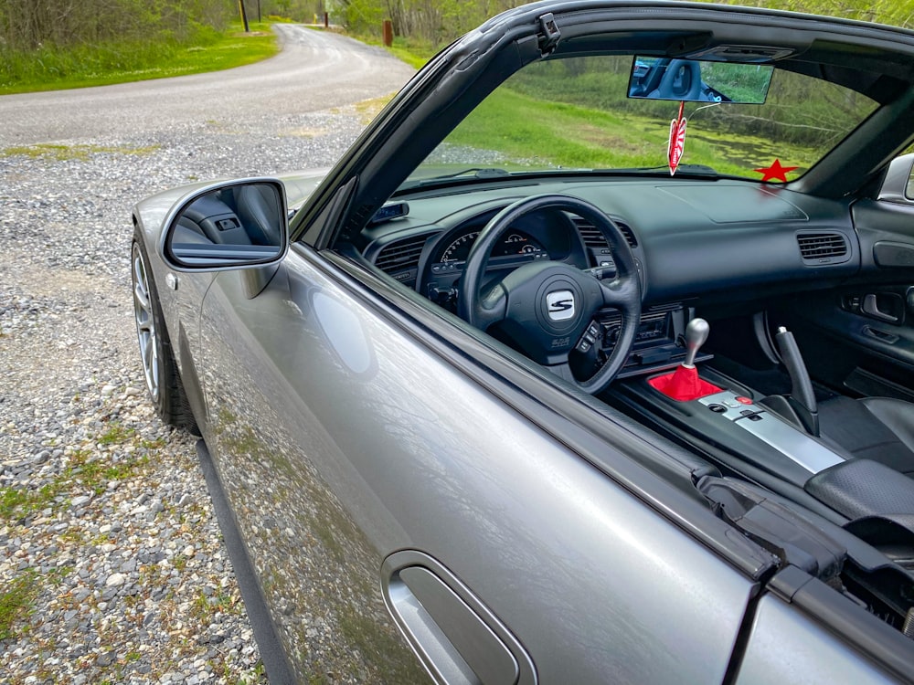 a car is parked on the side of the road