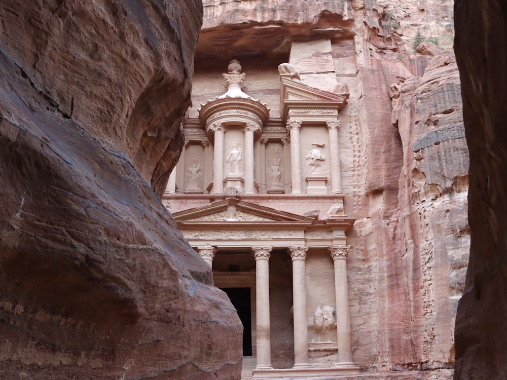 a building built into the side of a cliff