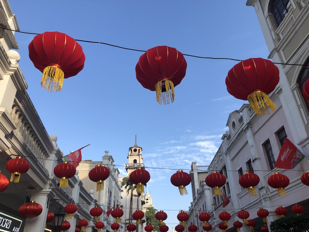 a street filled with lots of red lanterns