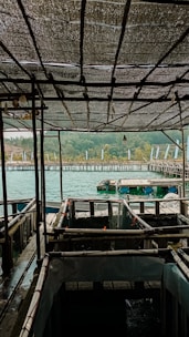 a view of a dock with boats in the water