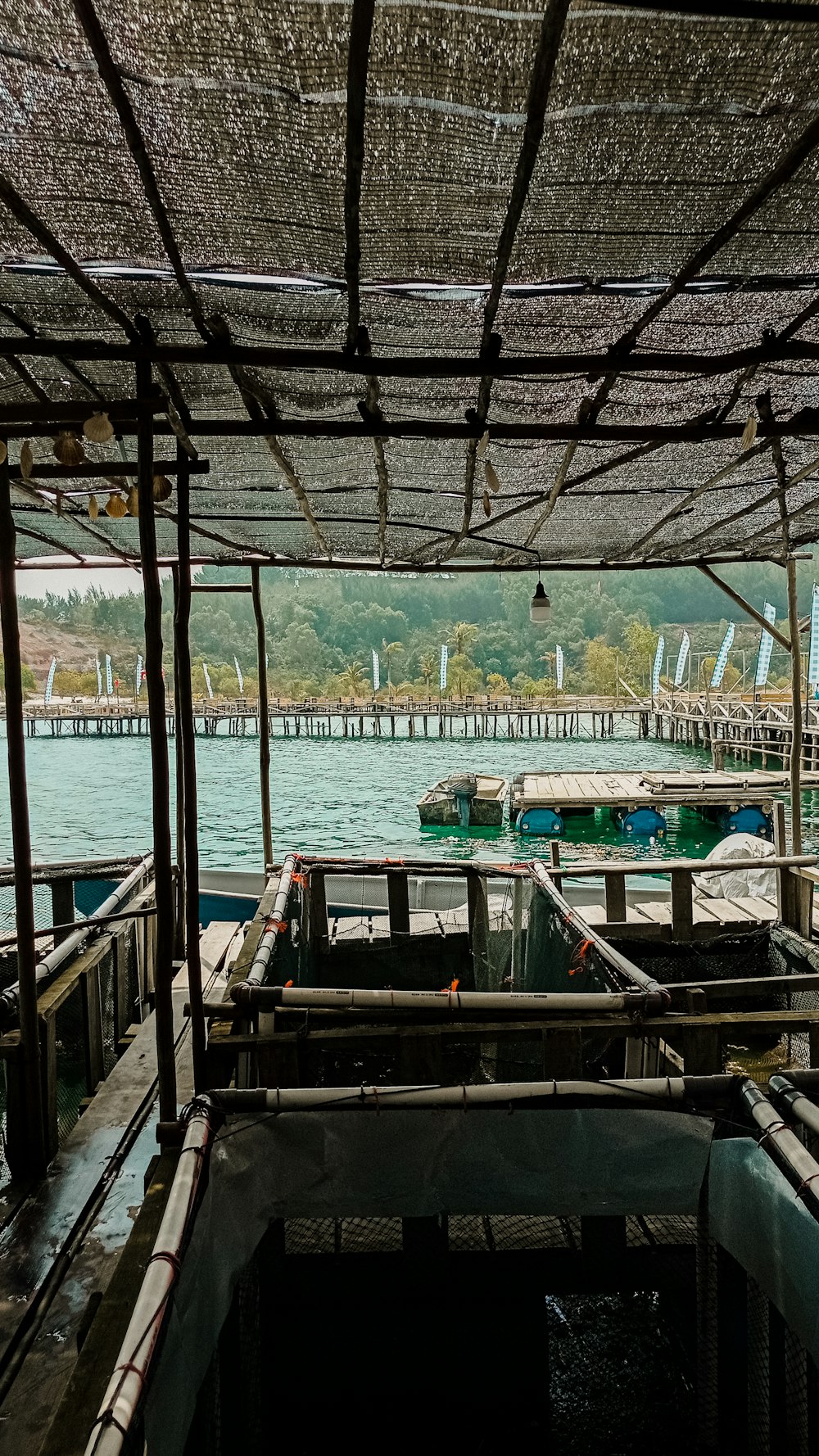 a view of a dock with boats in the water