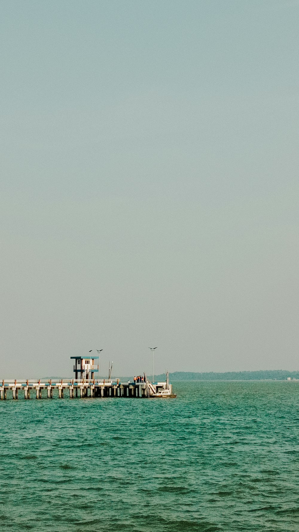 a large boat floating on top of a large body of water