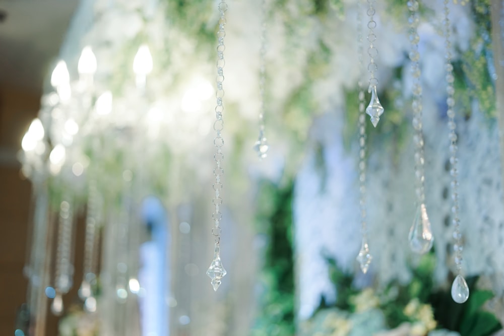 a bunch of drops of water hanging from a ceiling