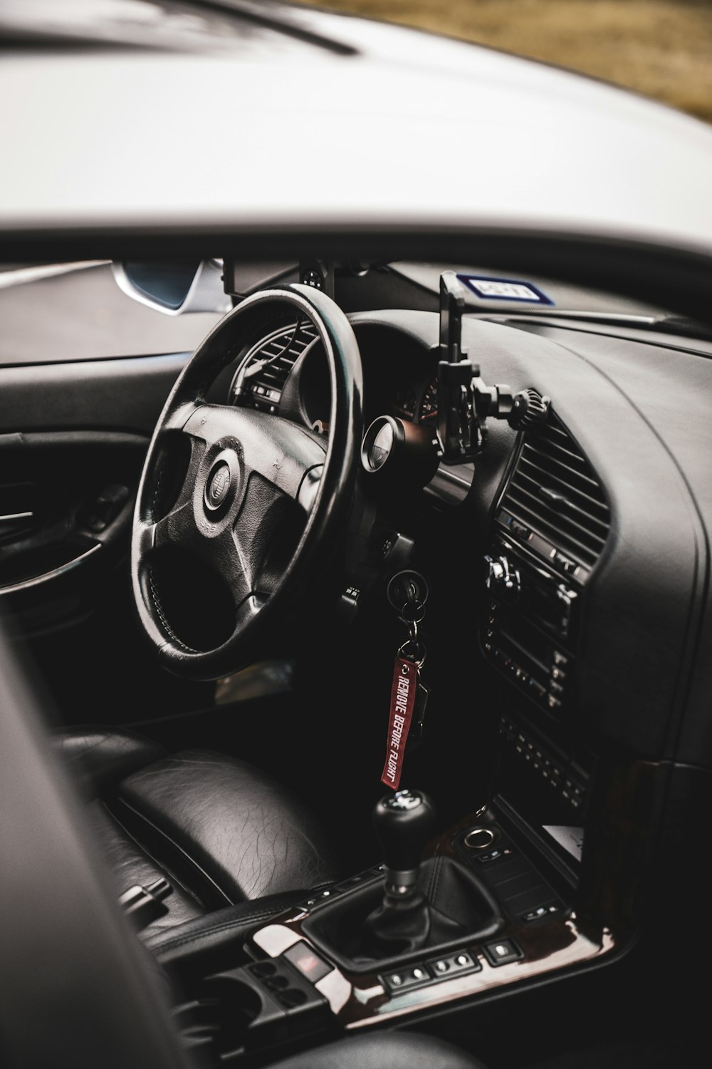 a steering wheel and dashboard of a car