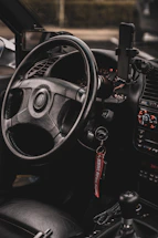 a steering wheel and dashboard of a car