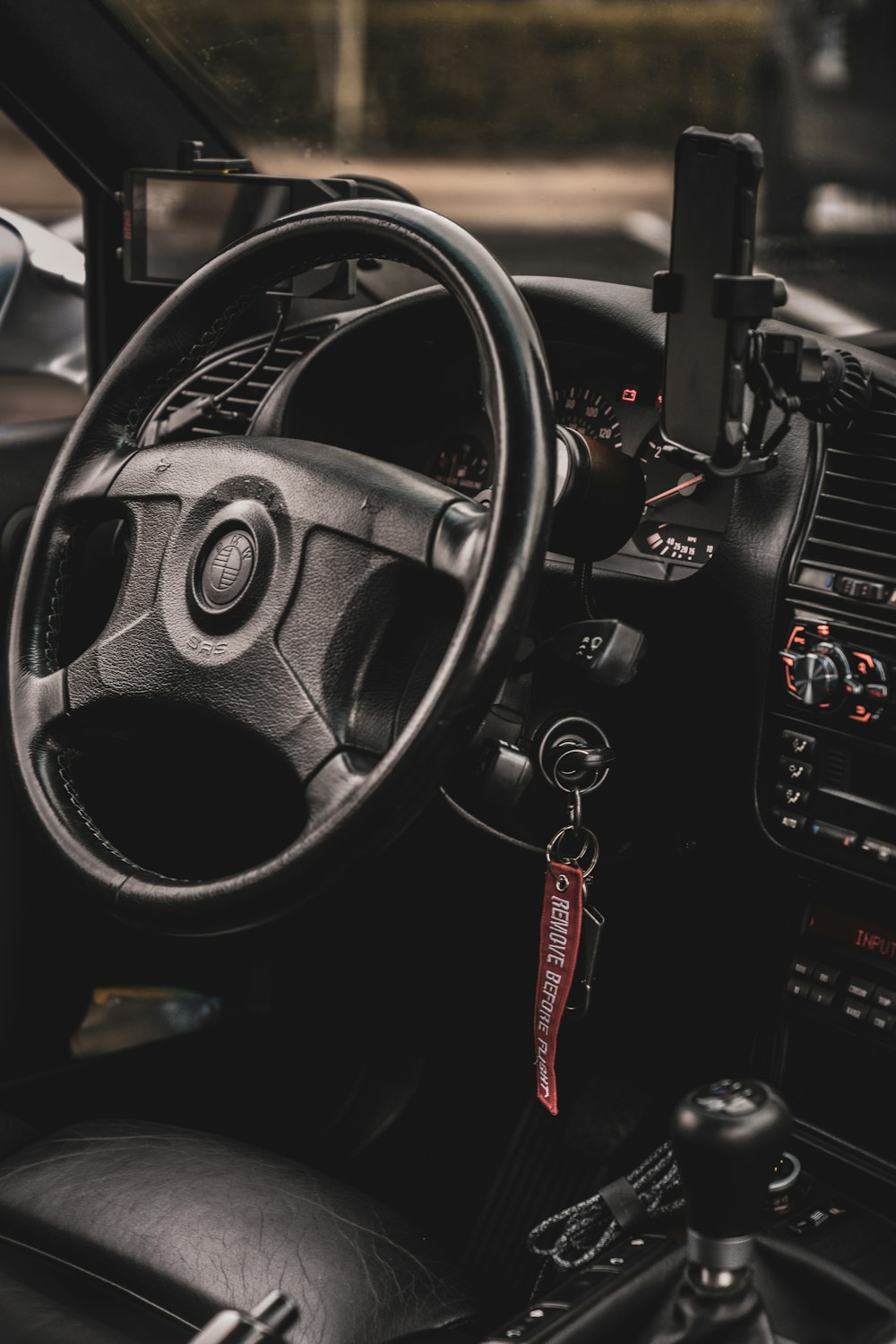 a steering wheel and dashboard of a car