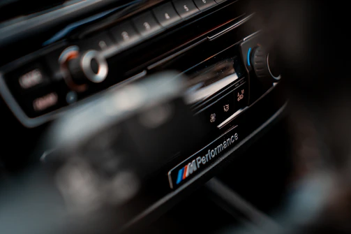 a close up of a radio in a car