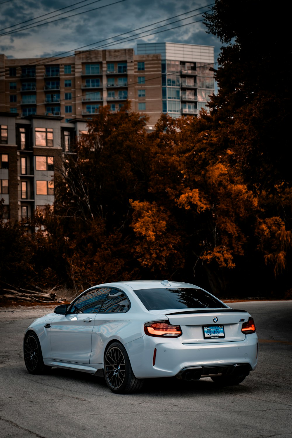 a white car parked on the side of the road