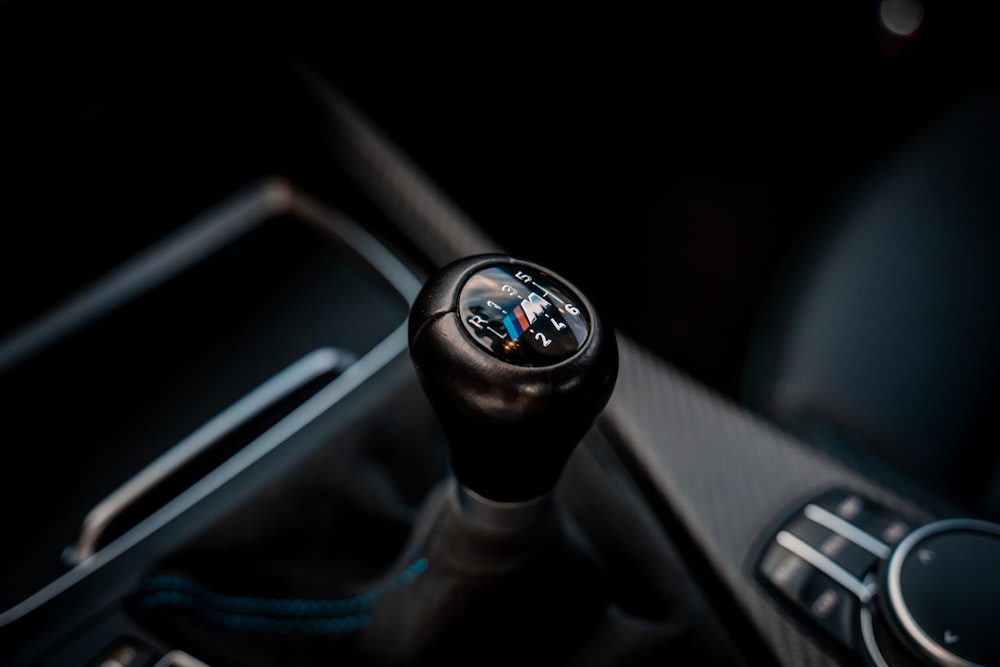 a close up of a steering wheel in a car