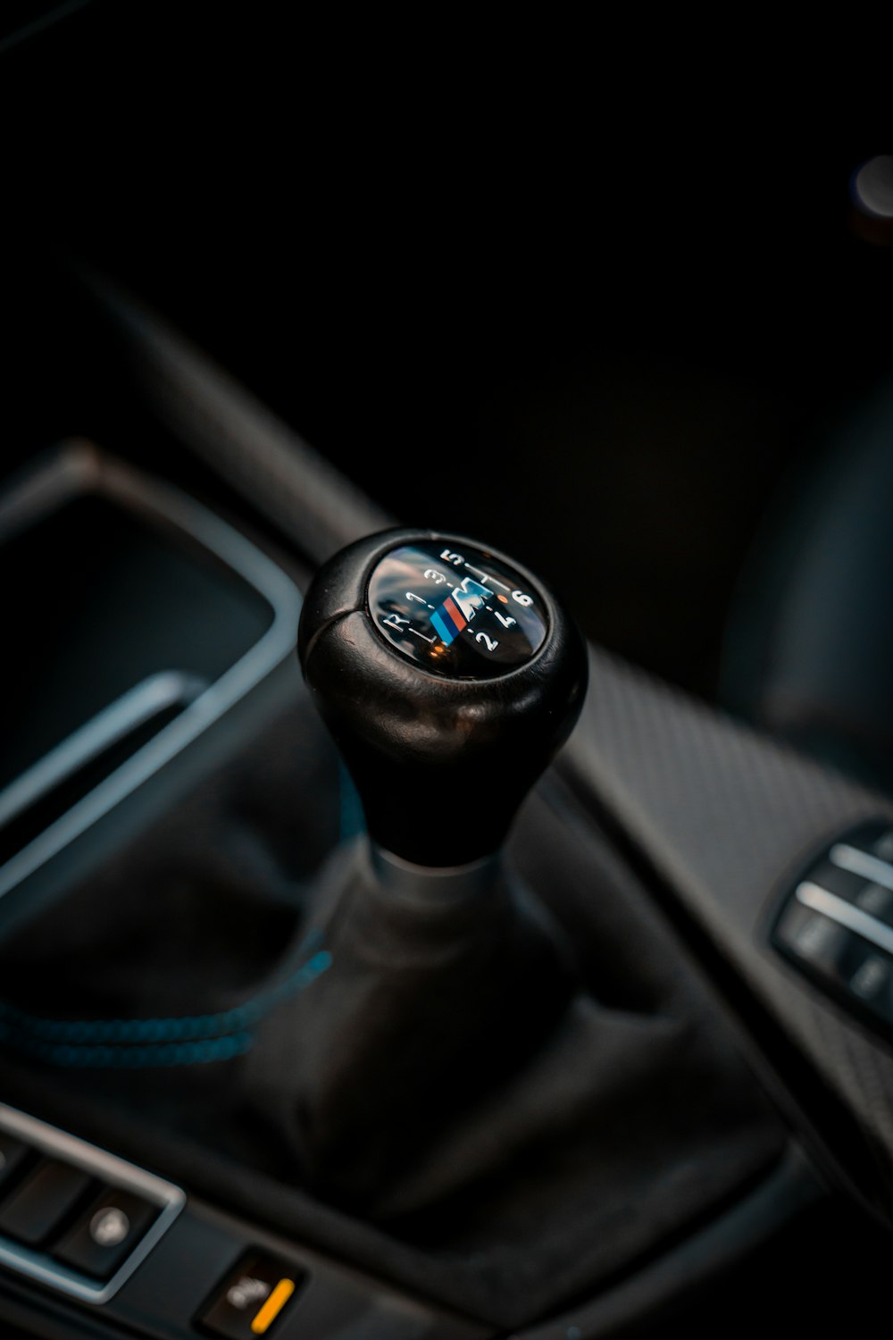 a close up of a steering wheel in a car