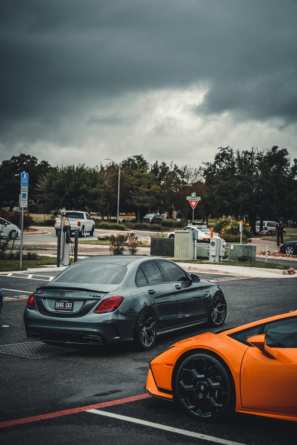 a couple of cars parked in a parking lot