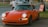 a red sports car parked in a parking lot