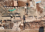 an aerial view of a construction site with a crane
