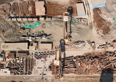 an aerial view of a construction site with a crane