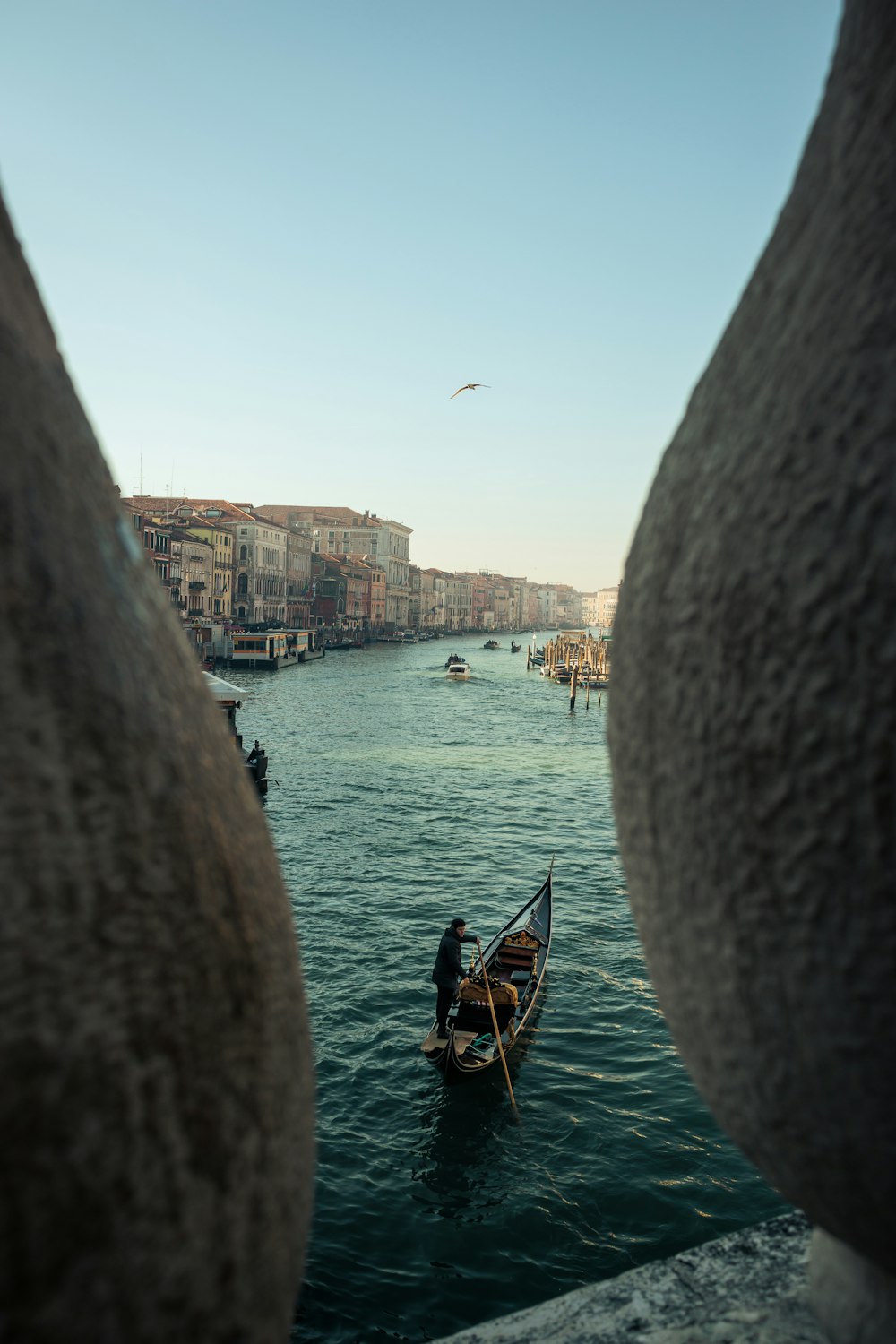 a couple of people on a small boat in the water