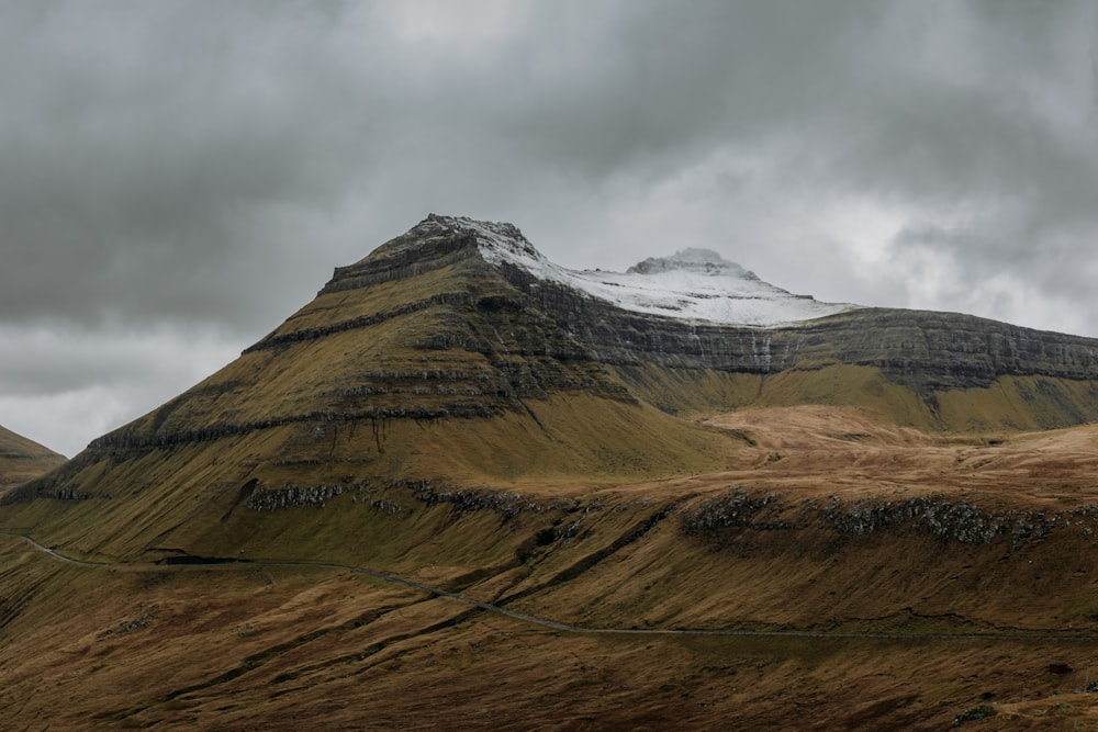 a mountain with a road going through it