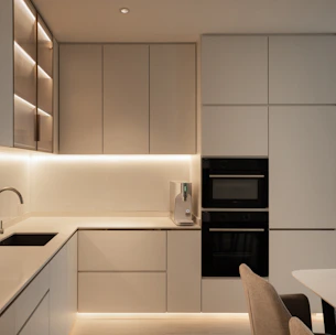 a kitchen with a table and chairs and a stove