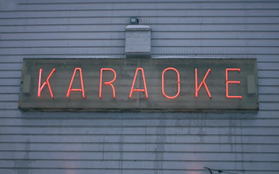 a neon sign on the side of a building