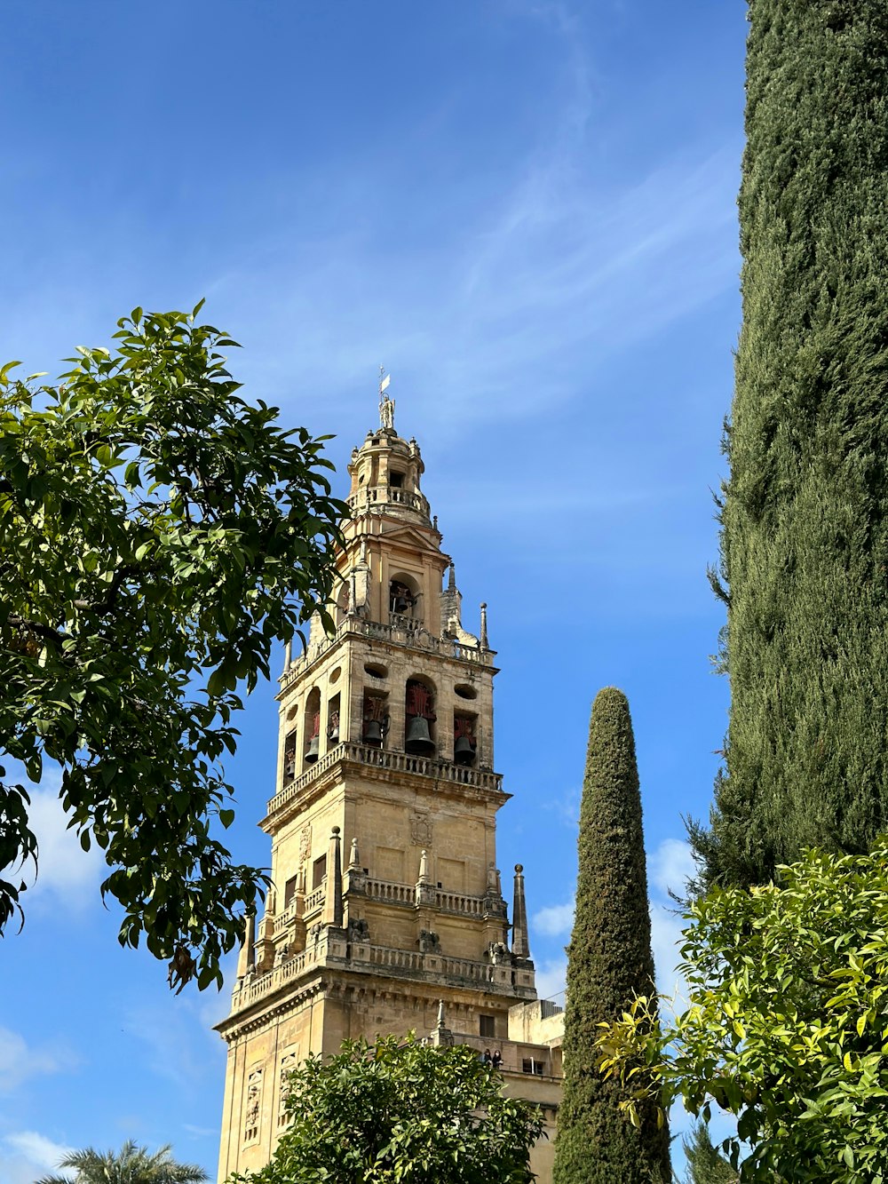 a tall tower with a clock on the top of it