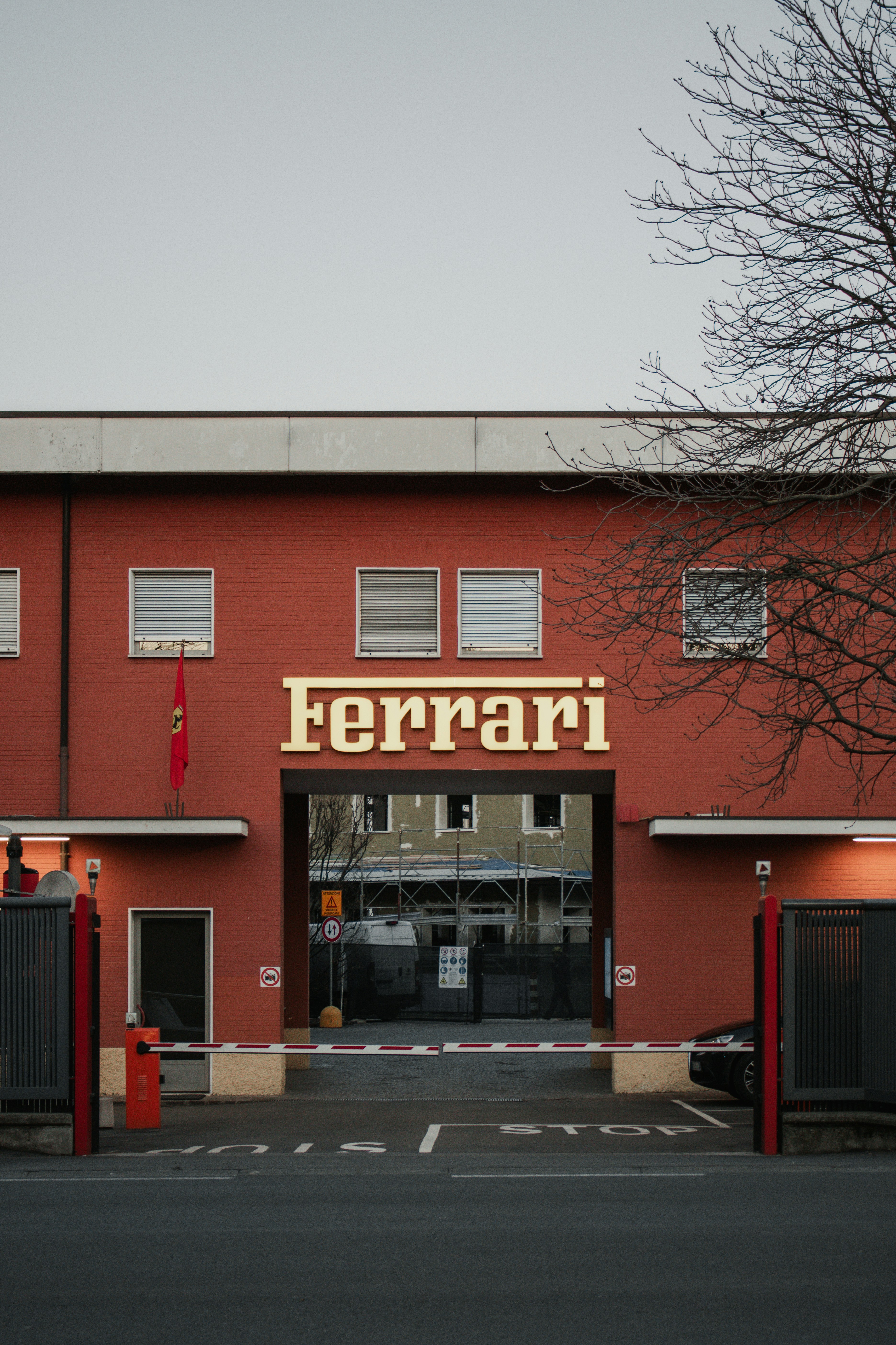 a red building with a sign on the front of it