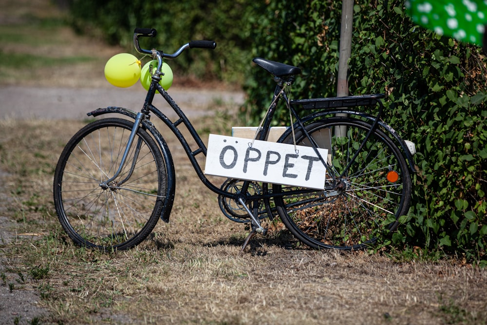 a bicycle with a sign that says oppet