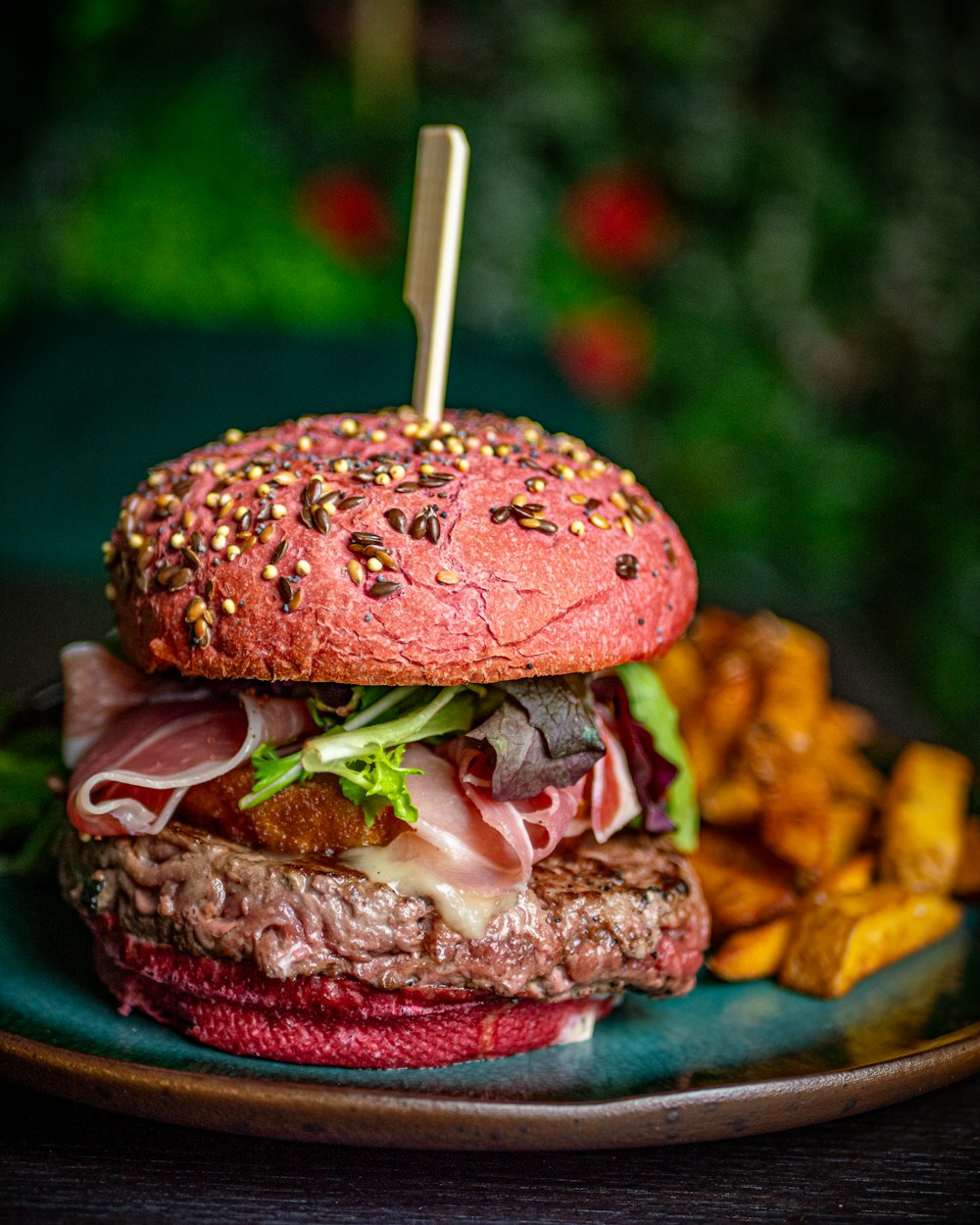 a hamburger with a toothpick on top of it