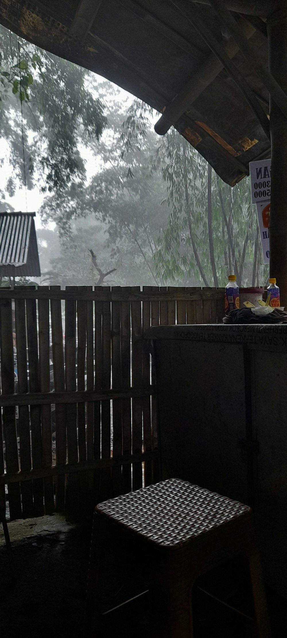 a table and a chair on a porch