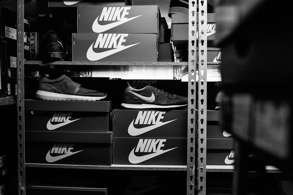 a black and white photo of a pair of nike shoes