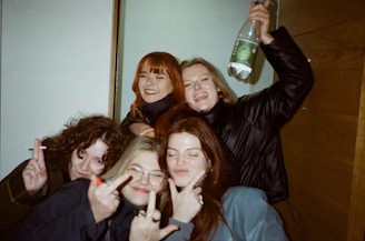 a group of young women posing for a picture
