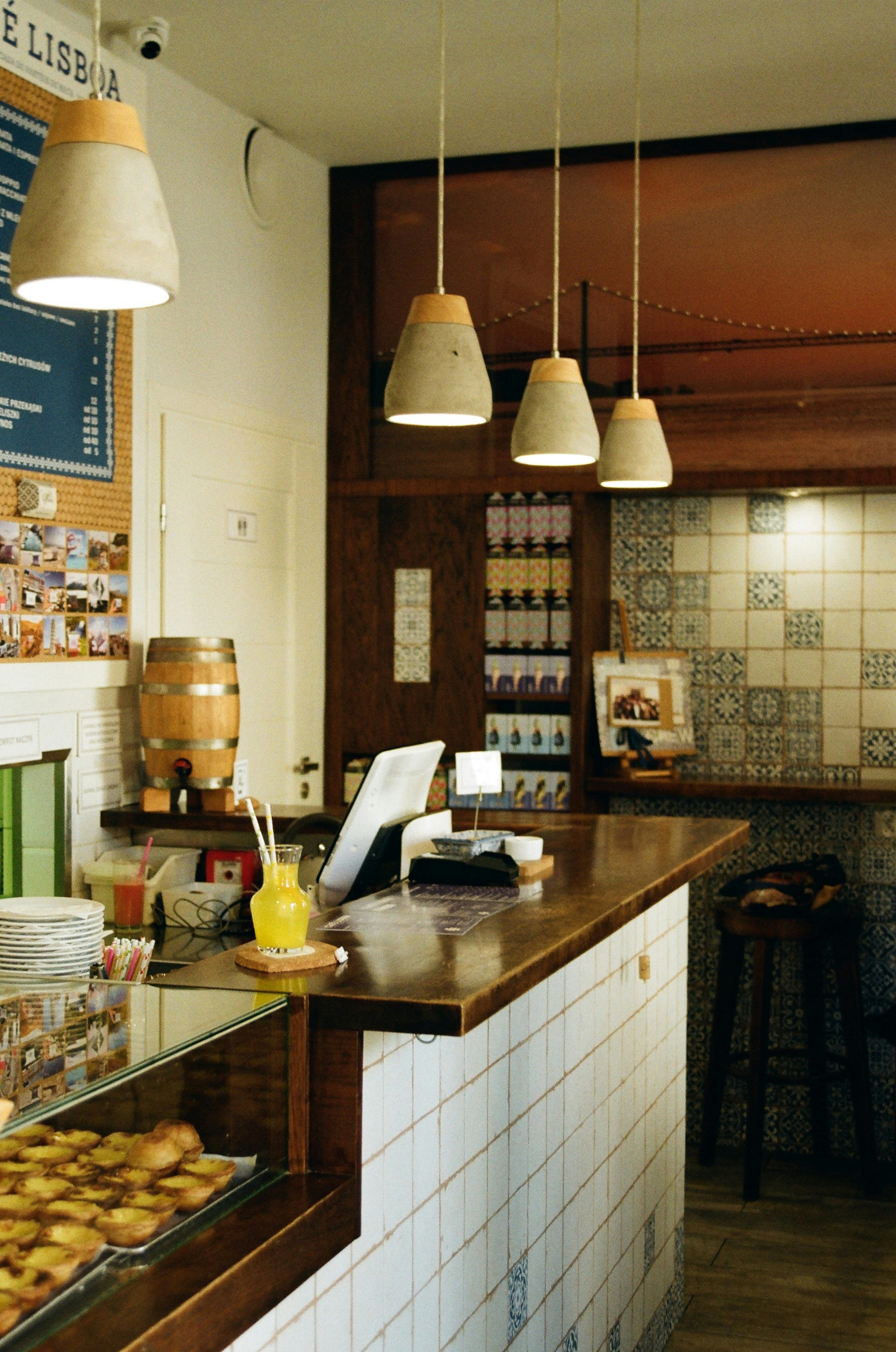 a bakery with a bunch of doughnuts on the counter