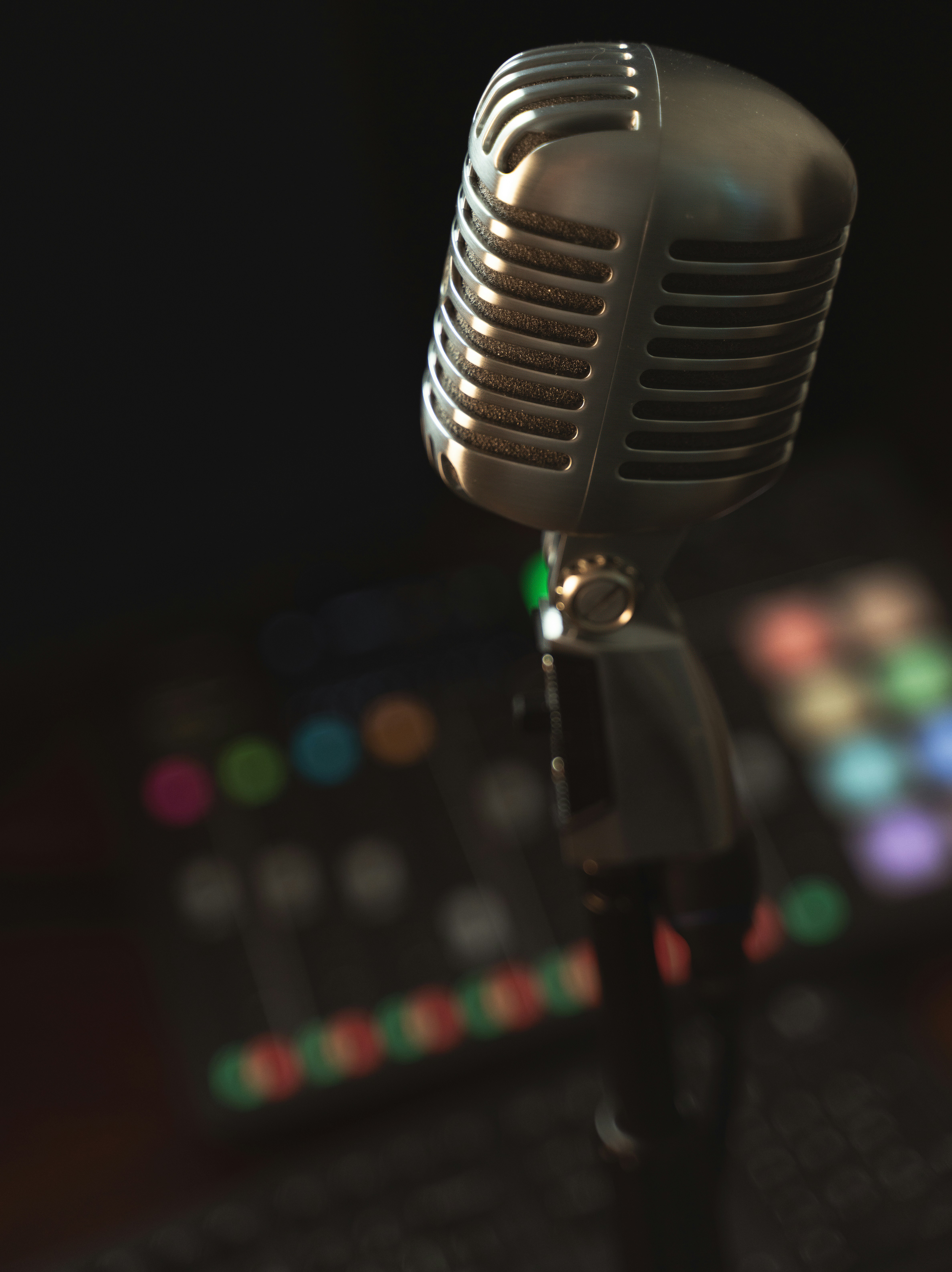 a microphone sitting on top of a keyboard