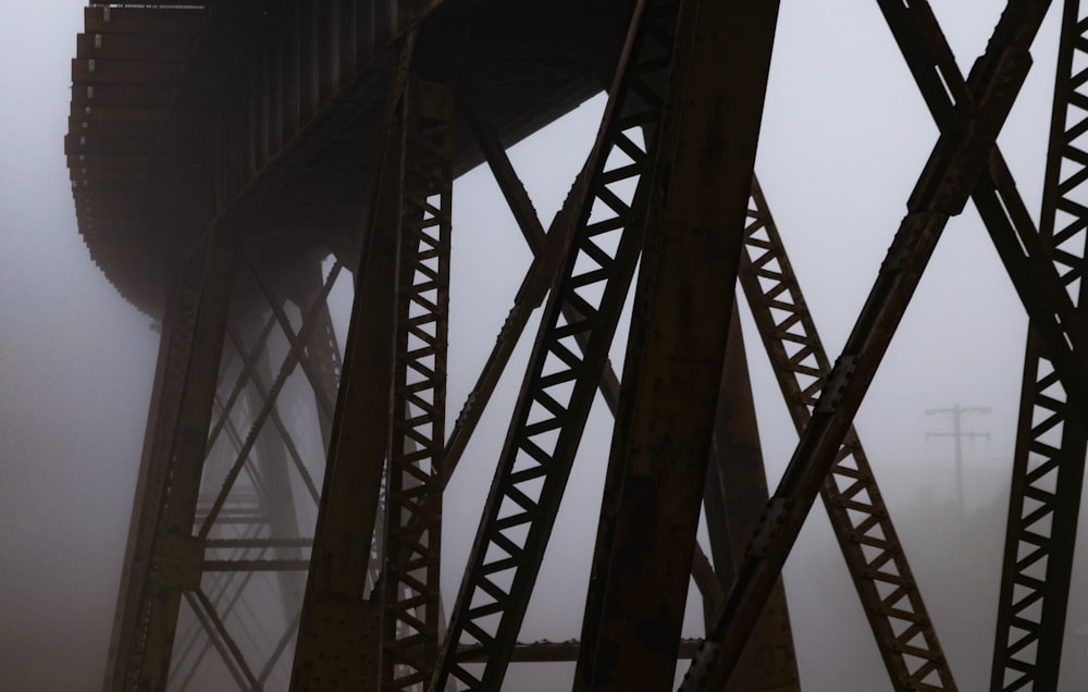 a train bridge in the fog on a foggy day
