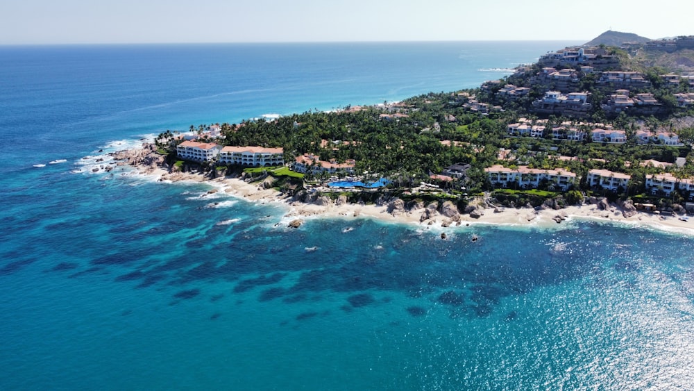 an aerial view of a resort on a tropical island