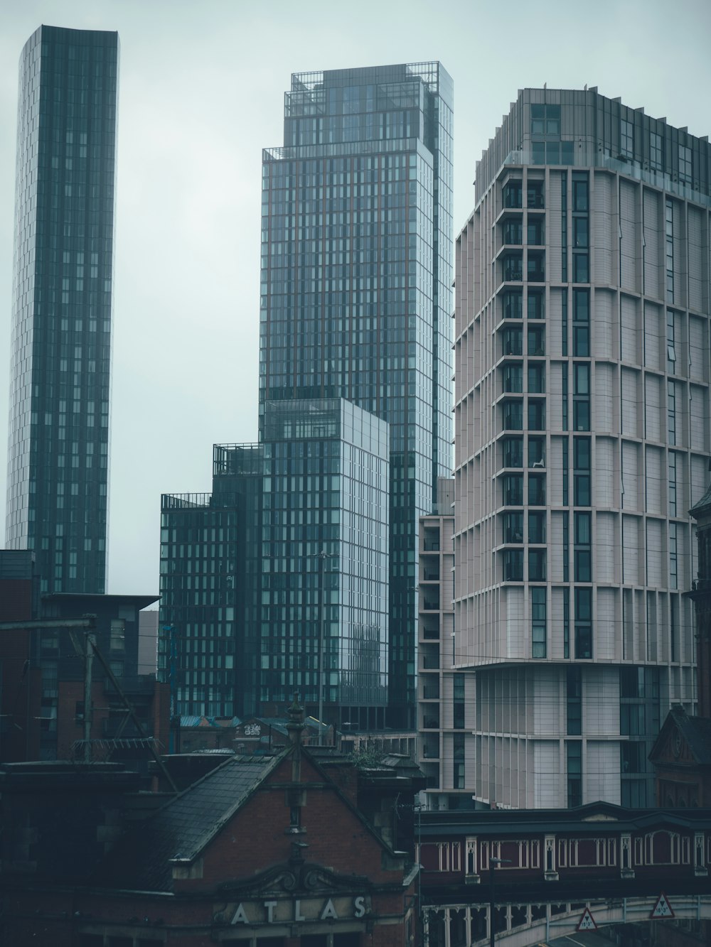 a group of tall buildings sitting next to each other