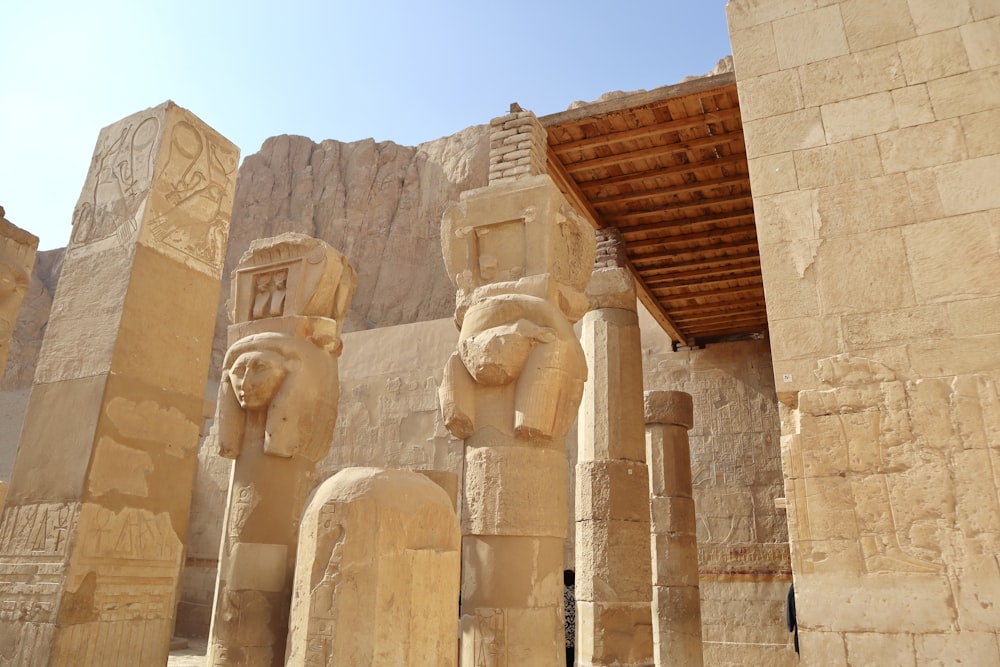 a group of statues in front of a building