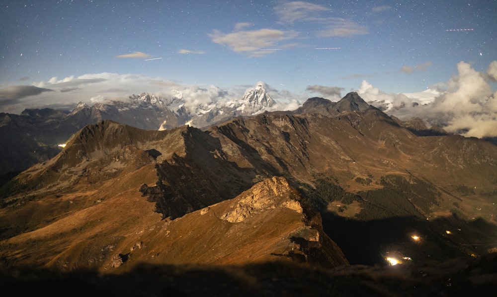 a view of a mountain range at night