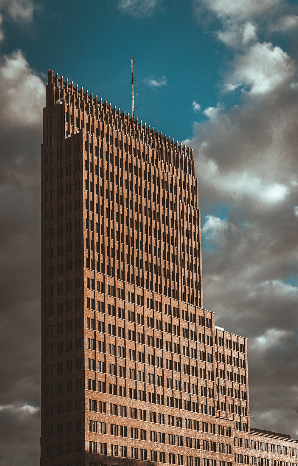 a tall building with a clock on the top of it